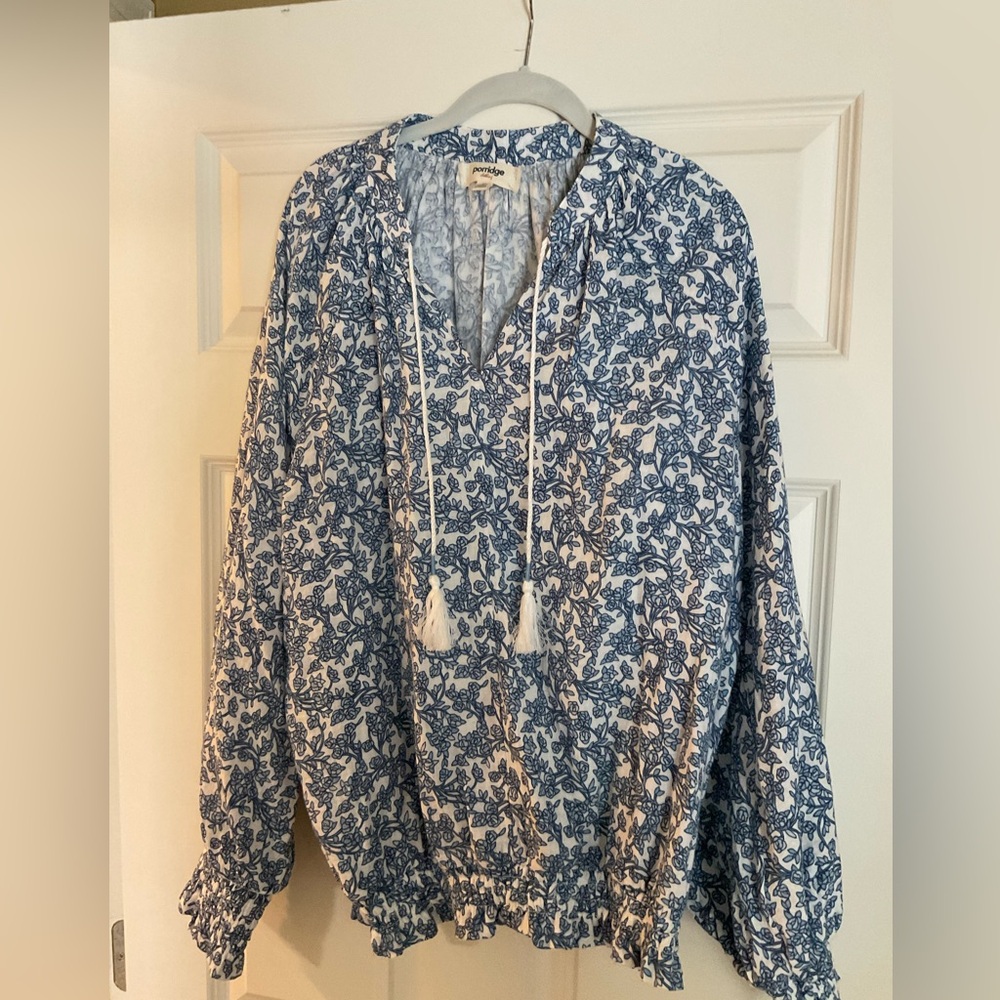 NWOT Anthropologie Blue Floral Peasant Blouse with shirred bottom and cuffs